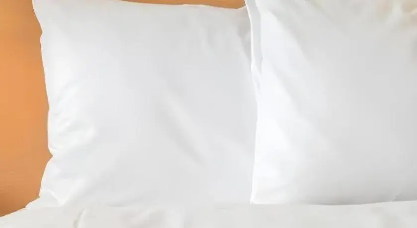 Bed in Holiday Inn Express Hotel & Suites Lamar By IHG Bed in Holiday Inn Express Hotel & Suites Lamar By IHG