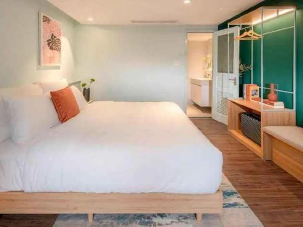 Bed in Lenid De Ho Guom Hotel