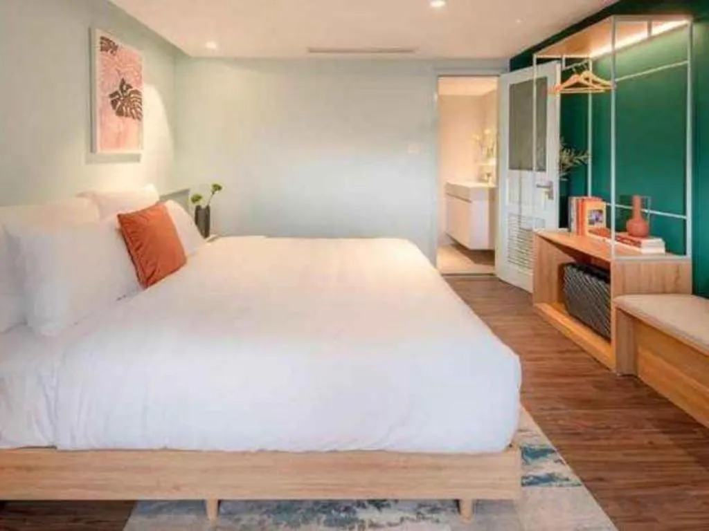 Bed in Lenid De Ho Guom Hotel