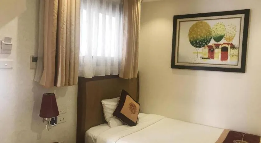 Bed in Lenid De Ho Guom Hotel