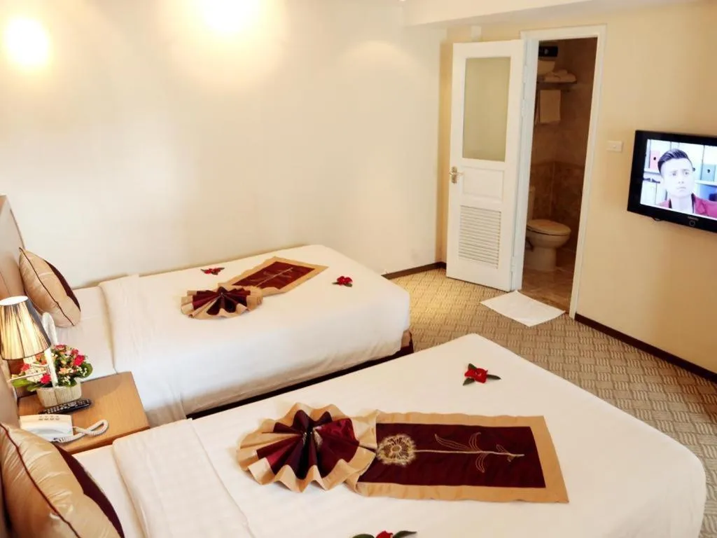 Bed in Lenid De Ho Guom Hotel