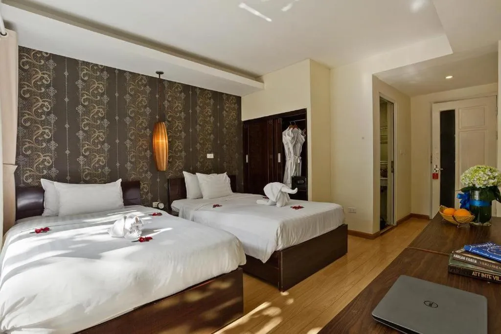 Bed in Hanoi Impressive Hotel