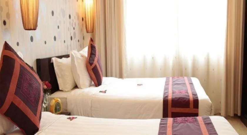 Bed in Hanoi Impressive Hotel