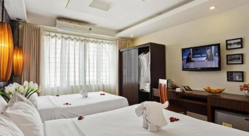 Bed in Hanoi Impressive Hotel