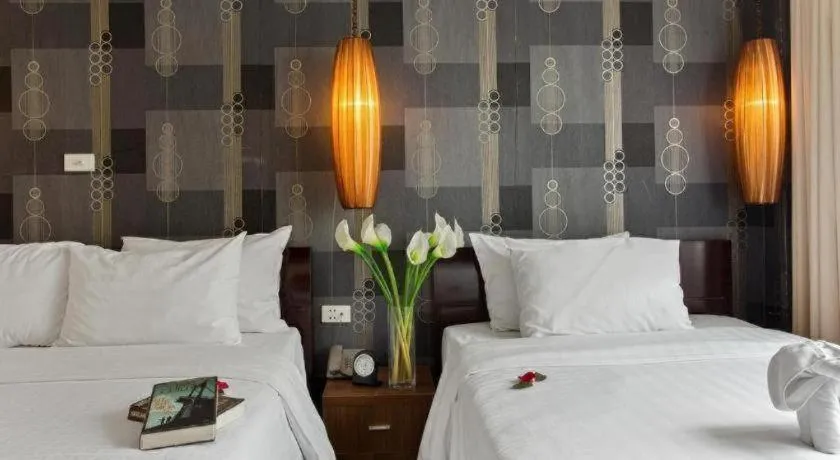 Bed in Hanoi Impressive Hotel