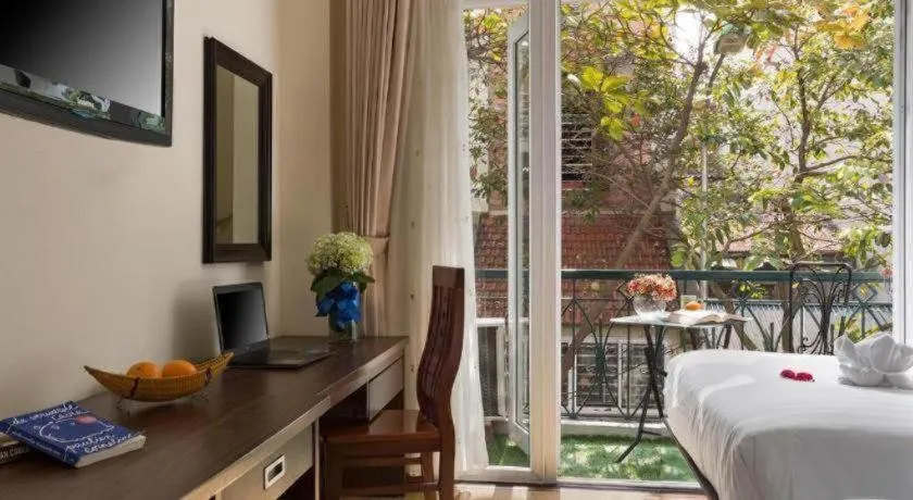 Bed in Hanoi Impressive Hotel