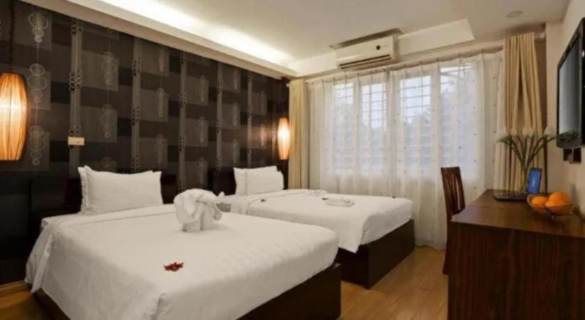 Bed in Hanoi Impressive Hotel