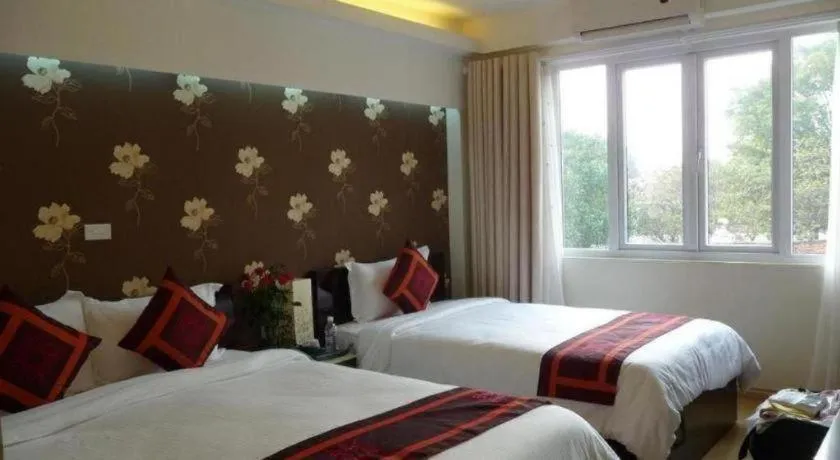 Bed in Hanoi Impressive Hotel