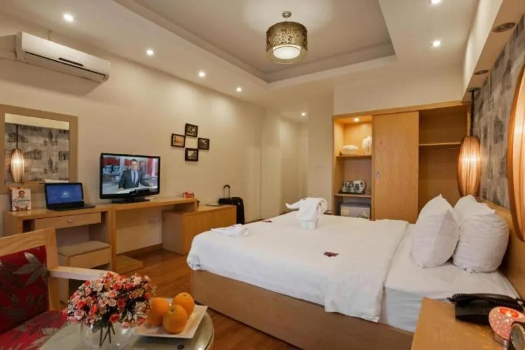 Bed in Hanoi Impressive Hotel