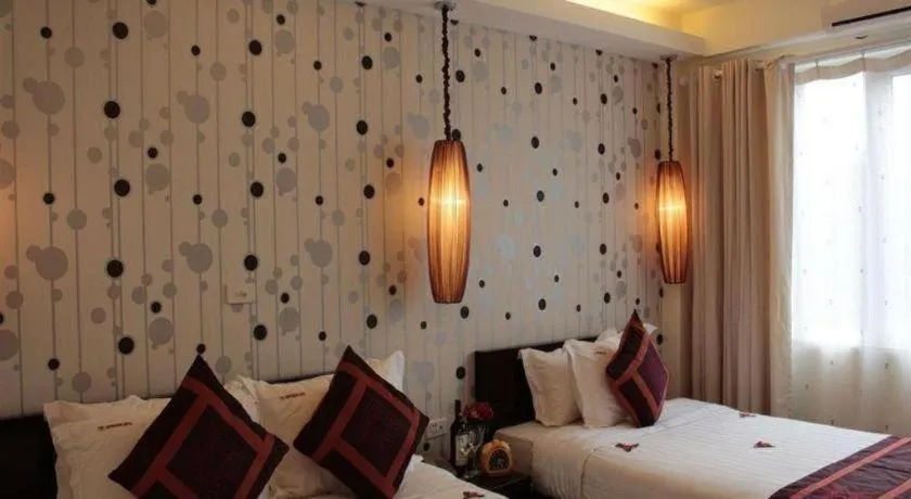 Bed in Hanoi Impressive Hotel