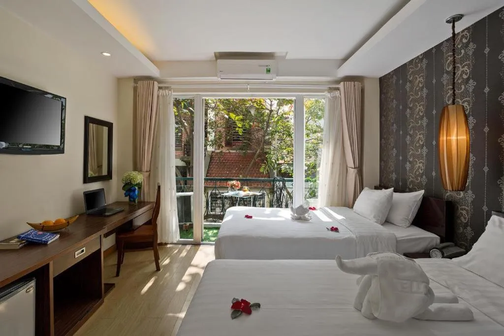 Bed in Hanoi Impressive Hotel