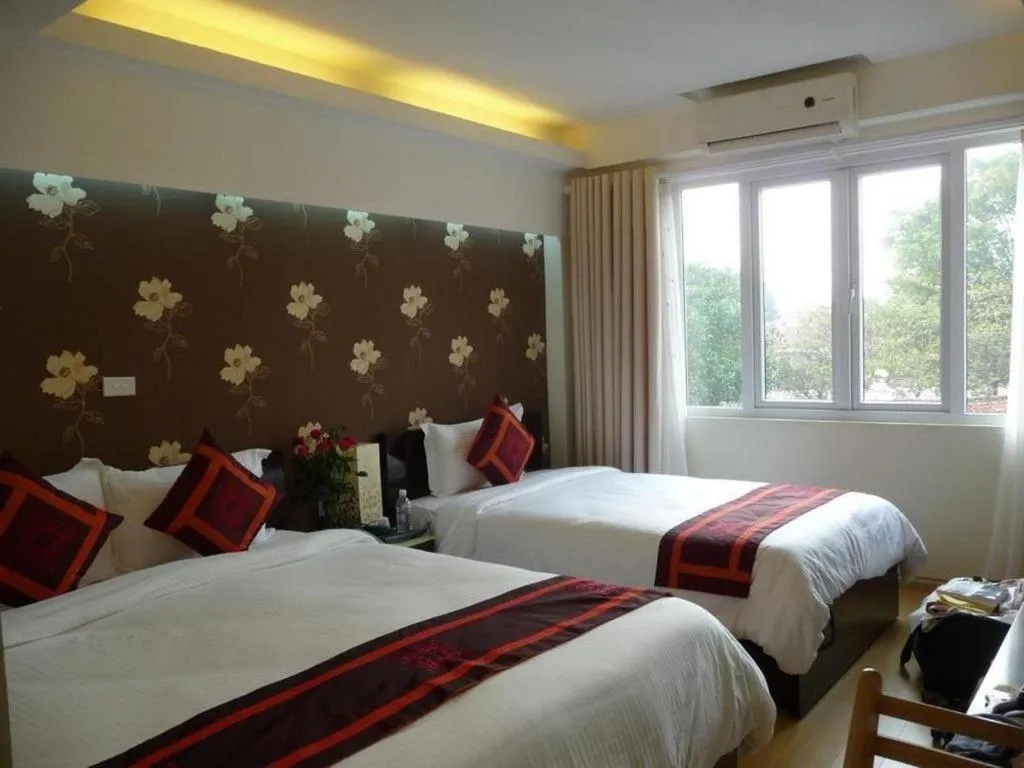 Bed in Hanoi Impressive Hotel