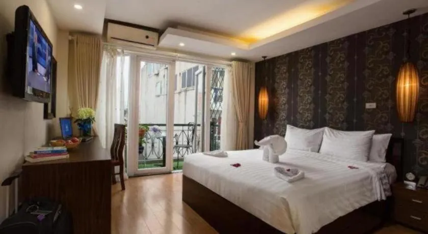 Bed in Hanoi Impressive Hotel