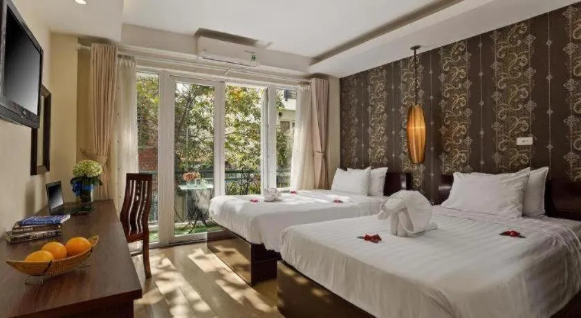 Bed in Hanoi Impressive Hotel