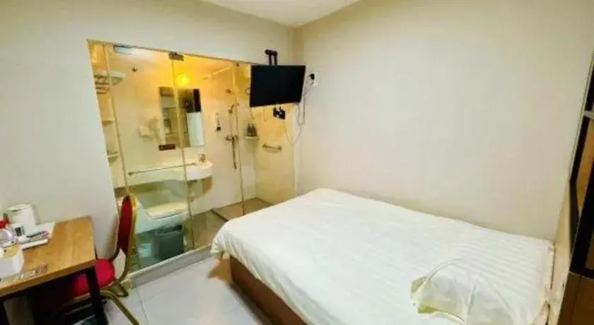 Bed in Jinjiang Inn Style Ningbo Railway Station Bed in Jinjiang Inn Style Ningbo Railway Station