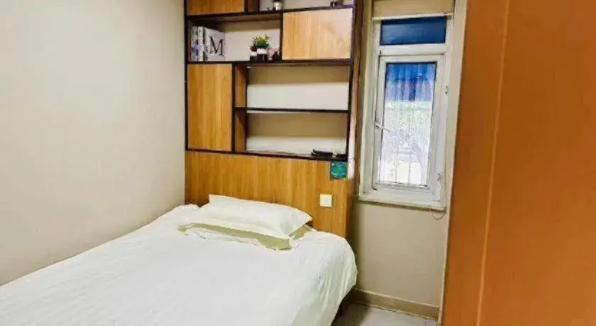 Bed in Jinjiang Inn Style Ningbo Railway Station Bed in Jinjiang Inn Style Ningbo Railway Station