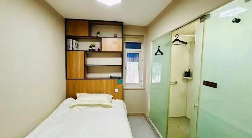 Bed in Jinjiang Inn Style Ningbo Railway Station Bed in Jinjiang Inn Style Ningbo Railway Station