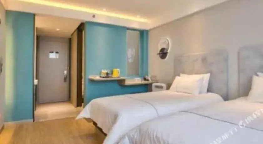 Bed in Jinjiang Inn Style Ningbo Railway Station Bed in Jinjiang Inn Style Ningbo Railway Station