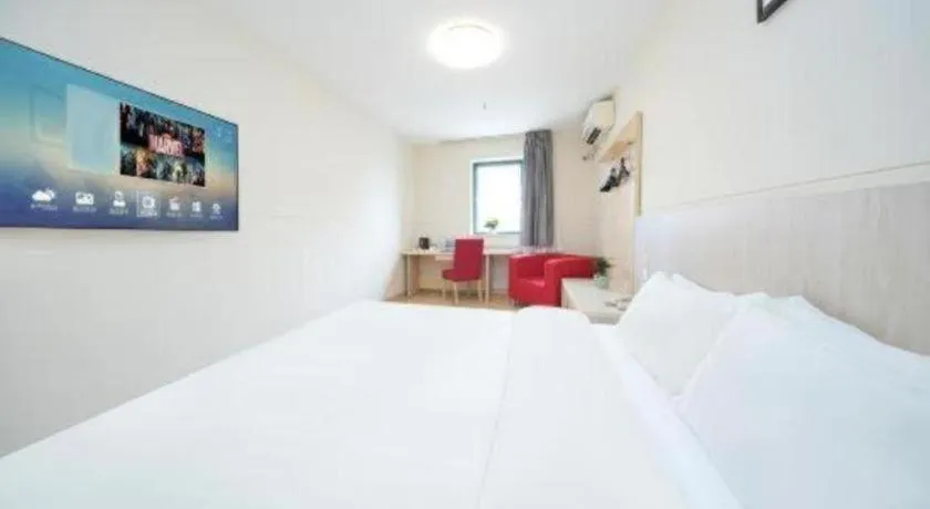 Bed in Jinjiang Inn Qingdao Hangzhou Rd.