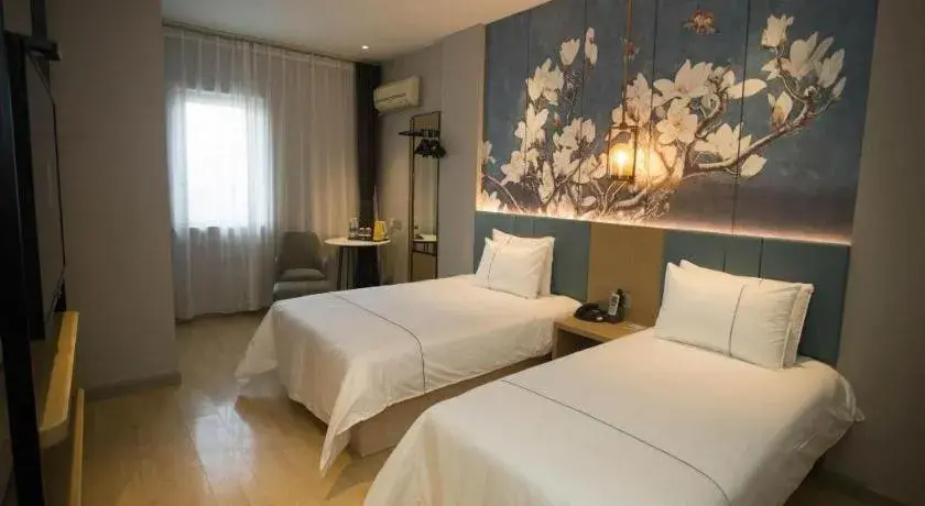 Bed in Jinjiang Inn Tianjin Station Jinwan Square Bed in Jinjiang Inn Tianjin Station Jinwan Square