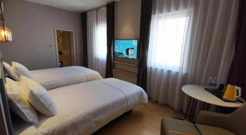 Bed in Jinjiang Inn Tianjin Station Jinwan Square