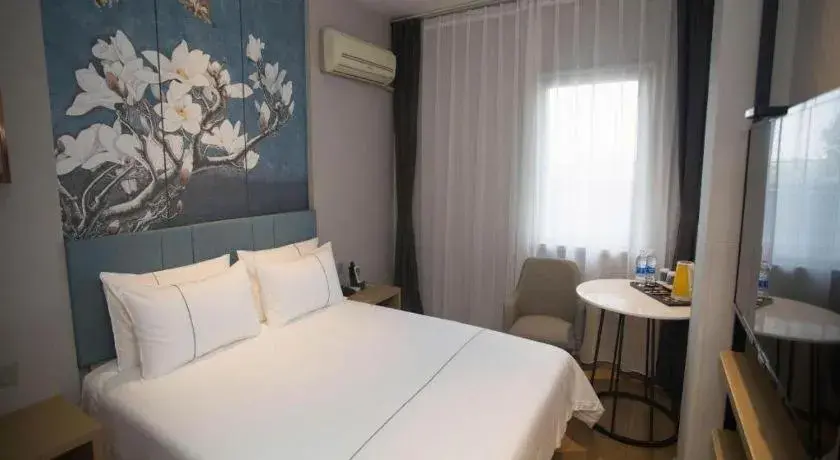 Bed in Jinjiang Inn Tianjin Station Jinwan Square Bed in Jinjiang Inn Tianjin Station Jinwan Square