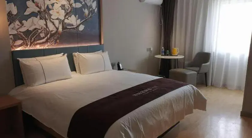 Bed in Jinjiang Inn Tianjin Station Jinwan Square Bed in Jinjiang Inn Tianjin Station Jinwan Square