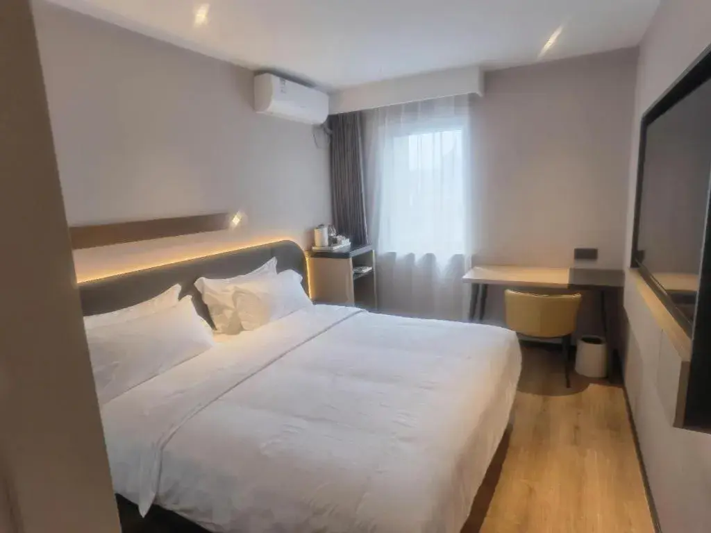 Bed in Jinjiang Inn Tianjin Station Jinwan Square Bed in Jinjiang Inn Tianjin Station Jinwan Square