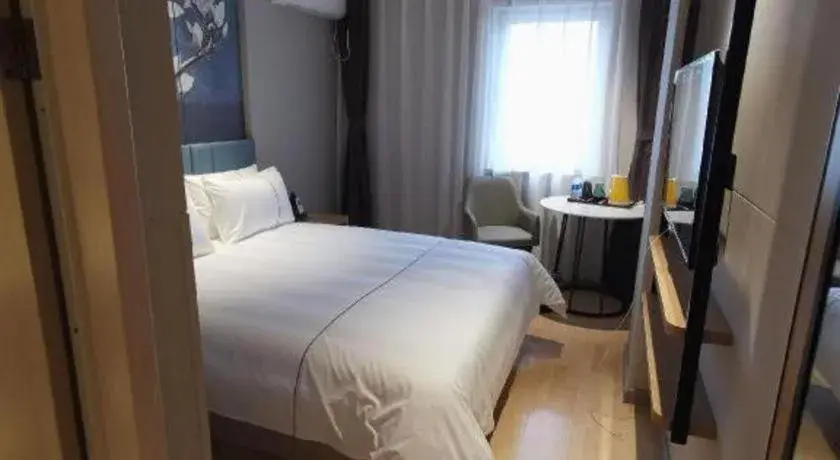 Bed in Jinjiang Inn Tianjin Station Jinwan Square Bed in Jinjiang Inn Tianjin Station Jinwan Square