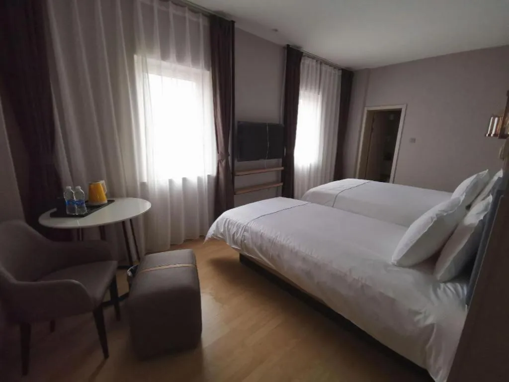 Bed in Jinjiang Inn Tianjin Station Jinwan Square