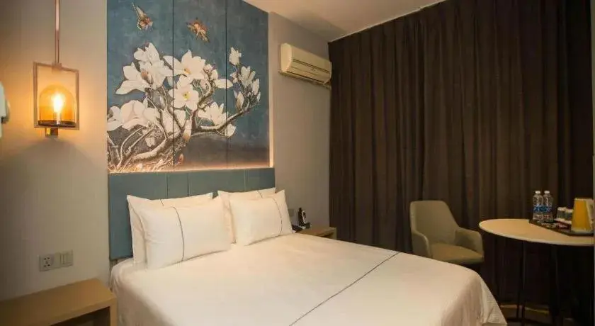 Bed in Jinjiang Inn Tianjin Station Jinwan Square Bed in Jinjiang Inn Tianjin Station Jinwan Square