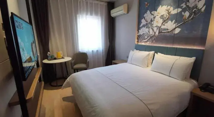 Bed in Jinjiang Inn Tianjin Station Jinwan Square Bed in Jinjiang Inn Tianjin Station Jinwan Square