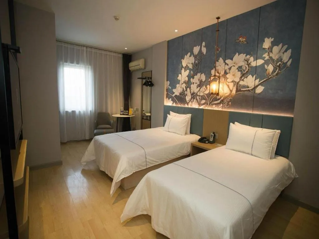 Bed in Jinjiang Inn Tianjin Station Jinwan Square