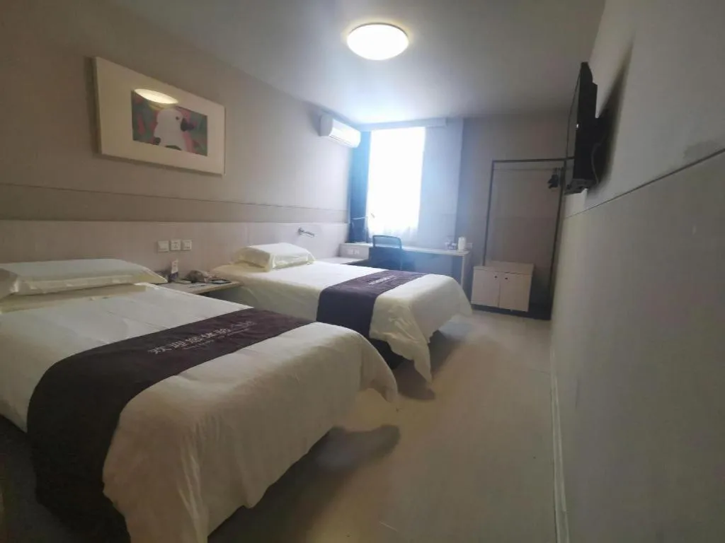 Bed in Jinjiang Inn Wuhan Hanjiang Road Metro Station Jiangtan Pedestrian Street