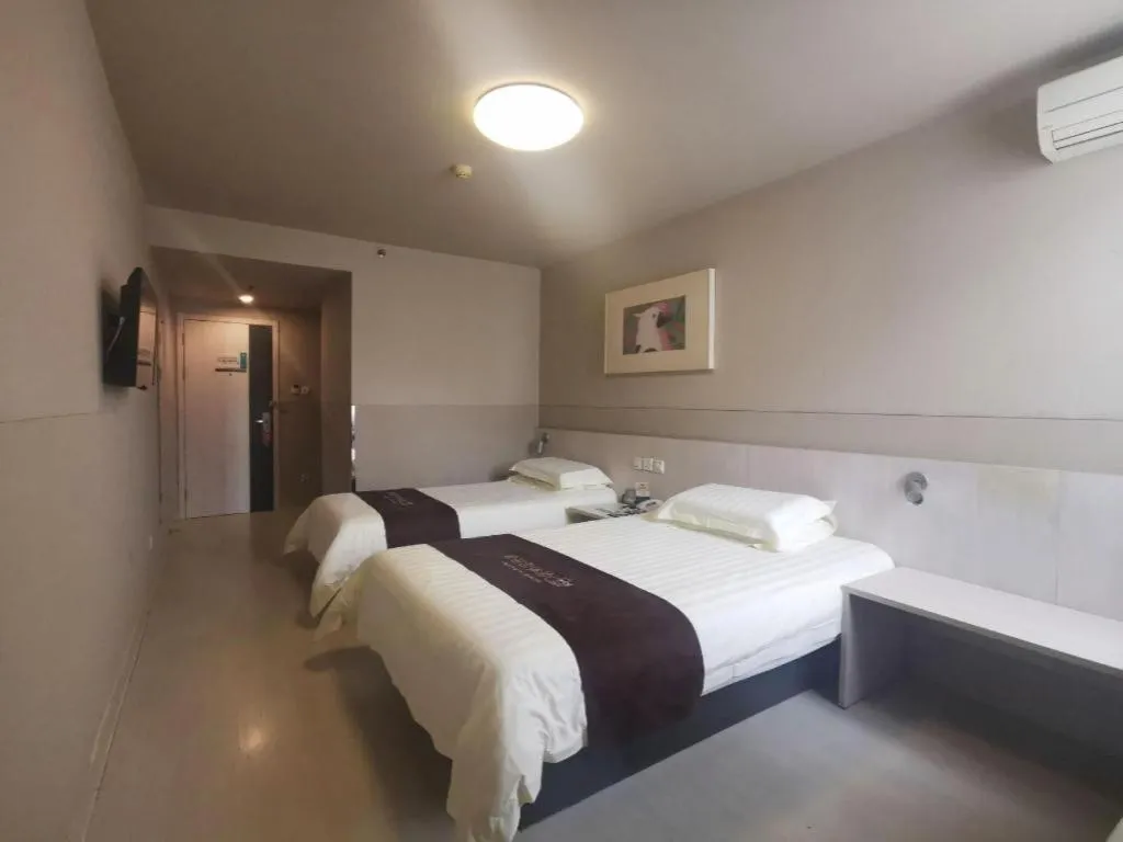 Bed in Jinjiang Inn Wuhan Hanjiang Road Metro Station Jiangtan Pedestrian Street