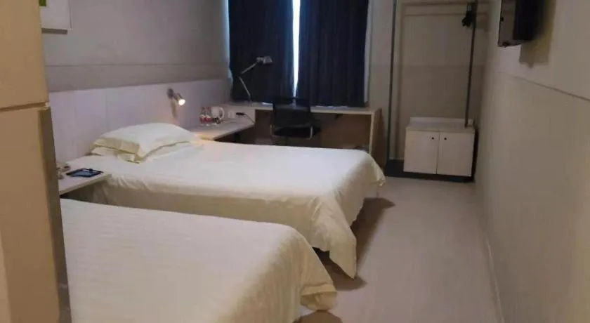 Bed in Jinjiang Inn Wuhan Hanjiang Road Metro Station Jiangtan Pedestrian Street