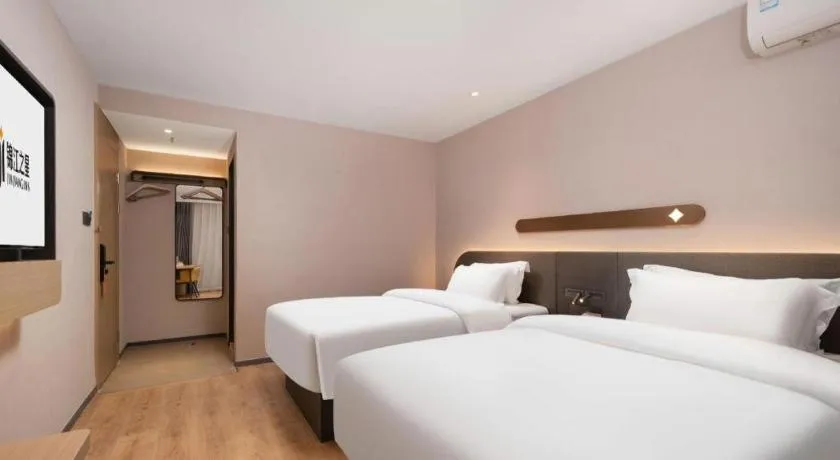 Bed in Jinjiang Inn Wuhan Hanjiang Road Metro Station Jiangtan Pedestrian Street