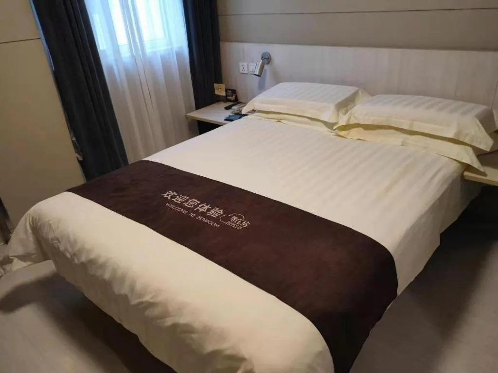 Bed in Jinjiang Inn Wuhan Hanjiang Road Metro Station Jiangtan Pedestrian Street