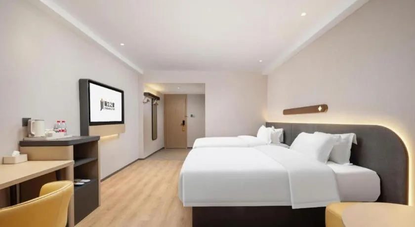 Bed in Jinjiang Inn Wuhan Hanjiang Road Metro Station Jiangtan Pedestrian Street