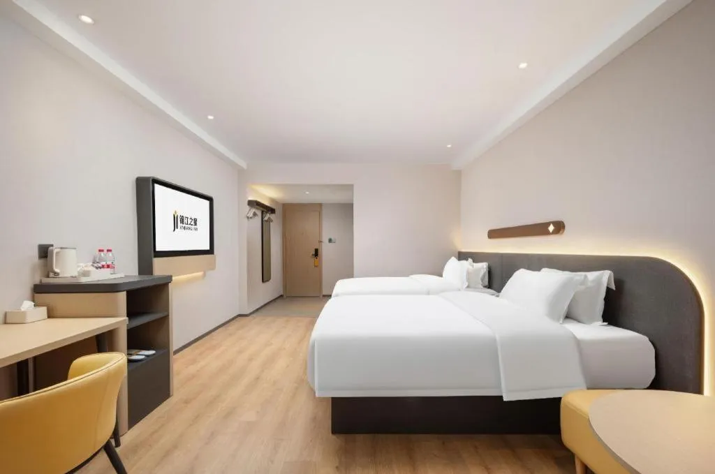 Bed in Jinjiang Inn Wuhan Hanjiang Road Metro Station Jiangtan Pedestrian Street