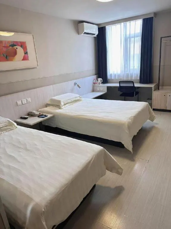 Bed in Jinjiang Inn Wuhan Hanjiang Road Metro Station Jiangtan Pedestrian Street