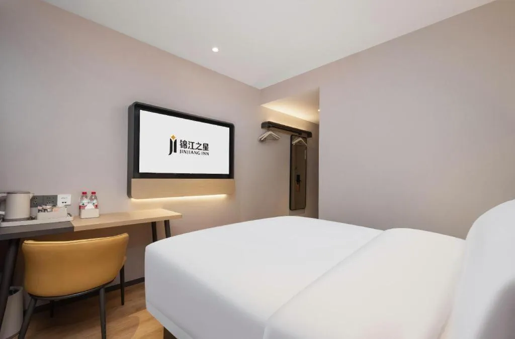 Bed in Jinjiang Inn Wuhan Hanjiang Road Metro Station Jiangtan Pedestrian Street