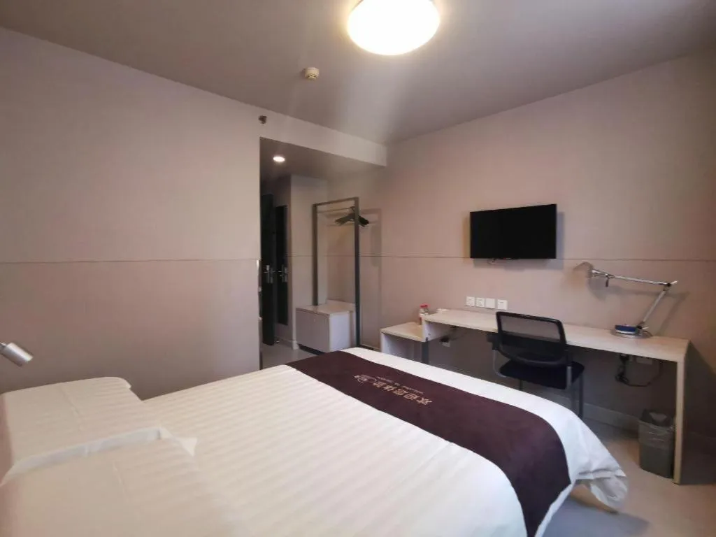 Bed in Jinjiang Inn Wuhan Hanjiang Road Metro Station Jiangtan Pedestrian Street