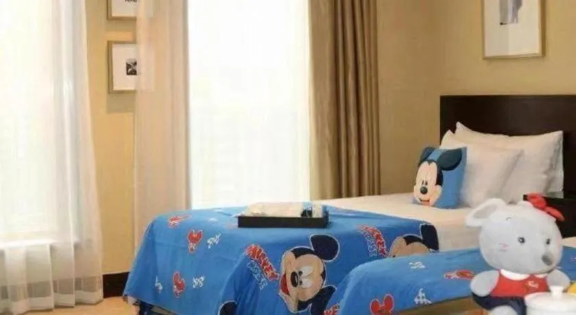 Bed in New Century Hangzhou Grand Hotel