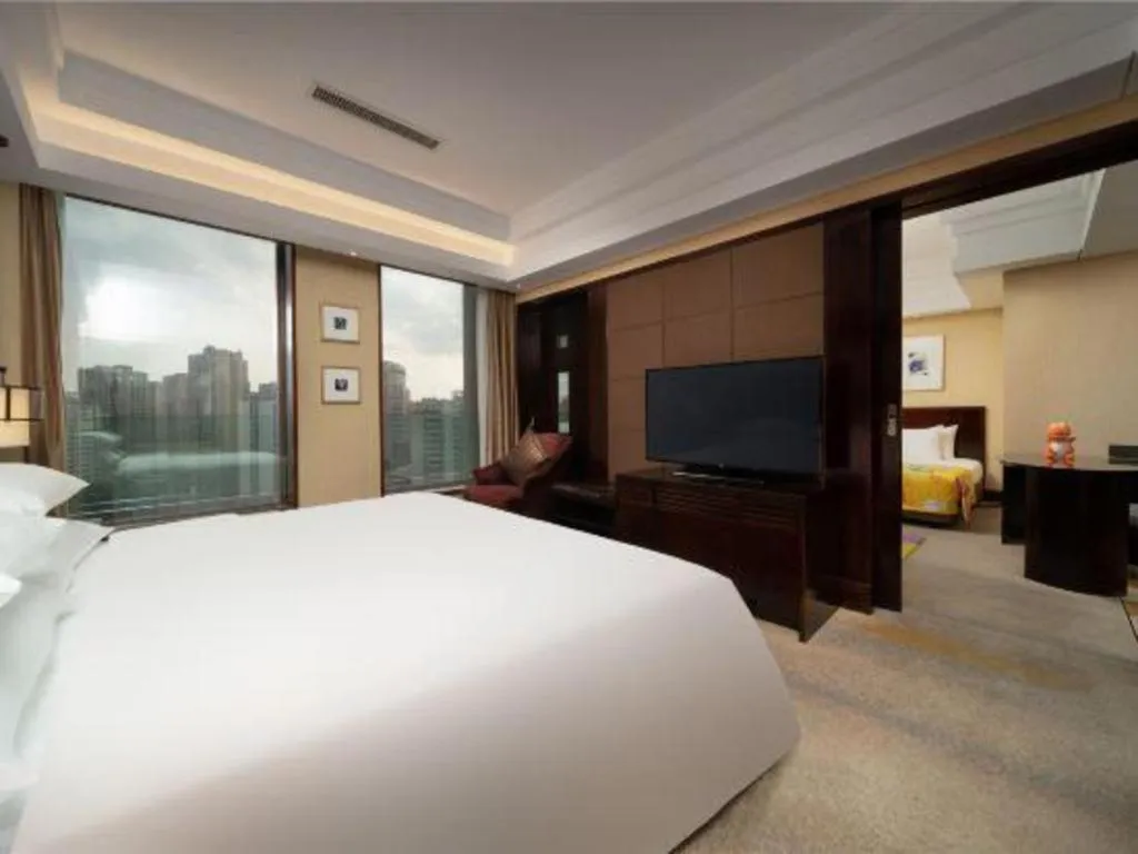 Bed in New Century Hangzhou Grand Hotel
