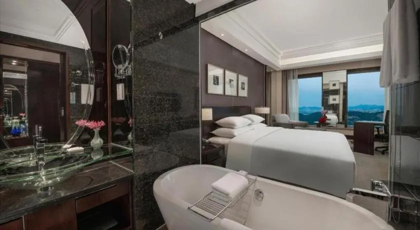 Bed in New Century Hangzhou Grand Hotel