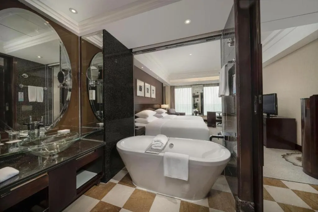 Bed in New Century Hangzhou Grand Hotel