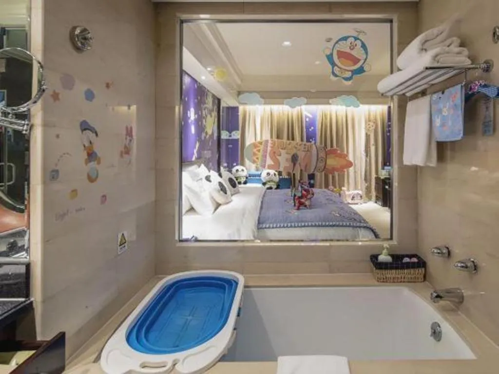 Bed in New Century Hangzhou Grand Hotel