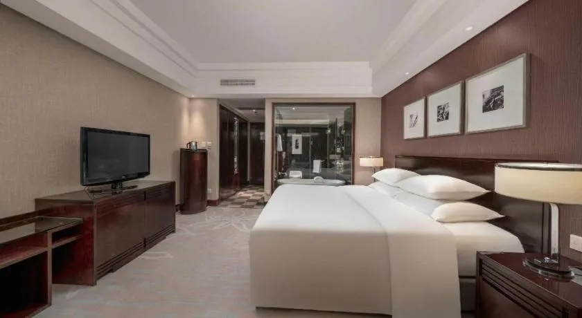 Bed in New Century Hangzhou Grand Hotel
