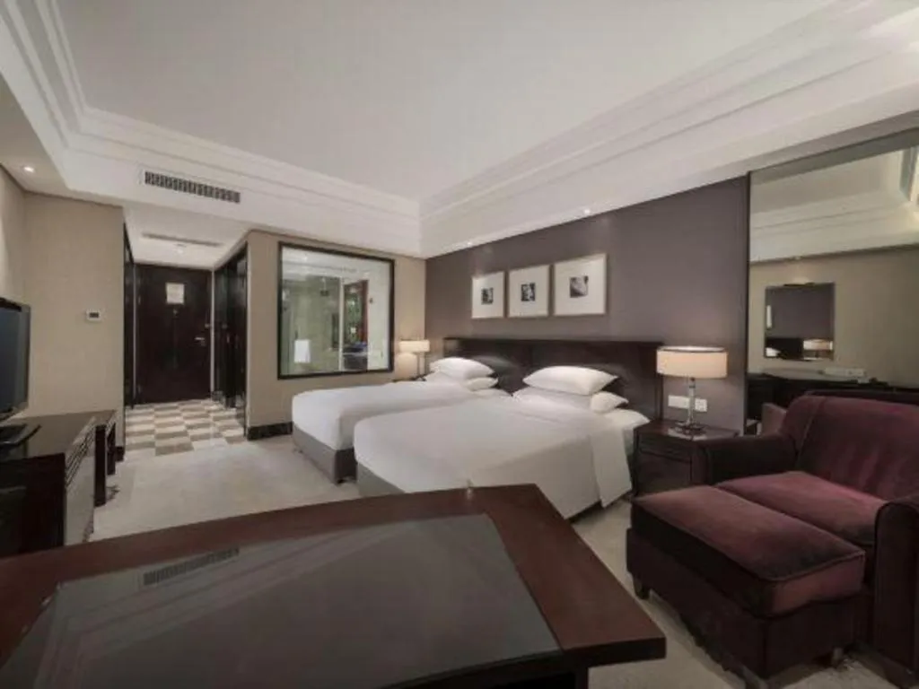 Bed in New Century Hangzhou Grand Hotel